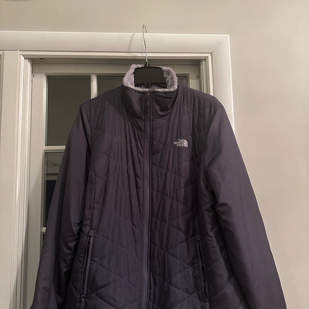 The North Face Black Ski Jacket with Quilted Design and Stand-Up Collar